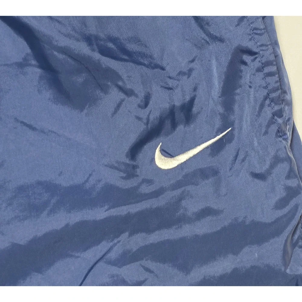 VTG Nike Windpants Mens XL Blue Nylon Track Pants Zipper Cuffs Lined Swoosh